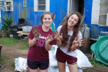 Emily and Ashleigh show that they aren't afraid to get heir hands dirty while joyfully caring for people in our community.